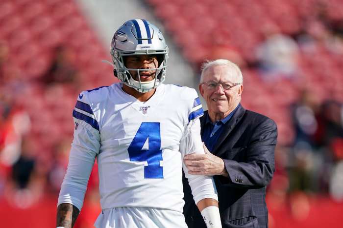 Dallas Cowboys quarterback Dak Prescott (4) and owner Jerry Jones (right).