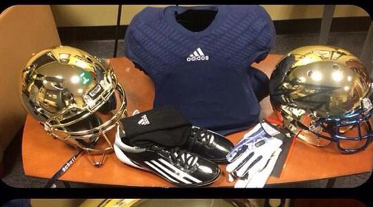 Akron Zips gold helmets