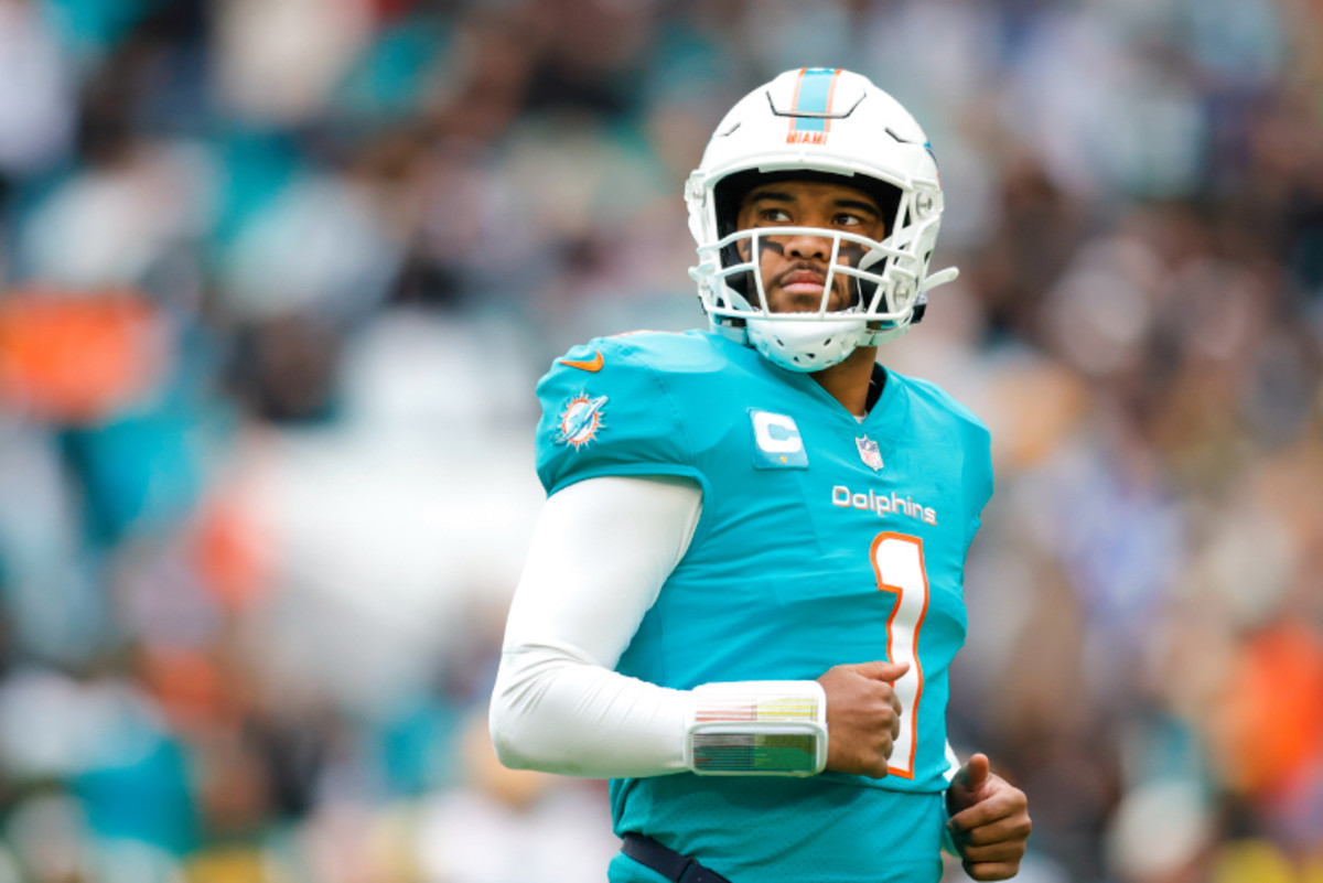 Miami Dolphins quarterback Tua Tagovailoa (1) reacts to a play