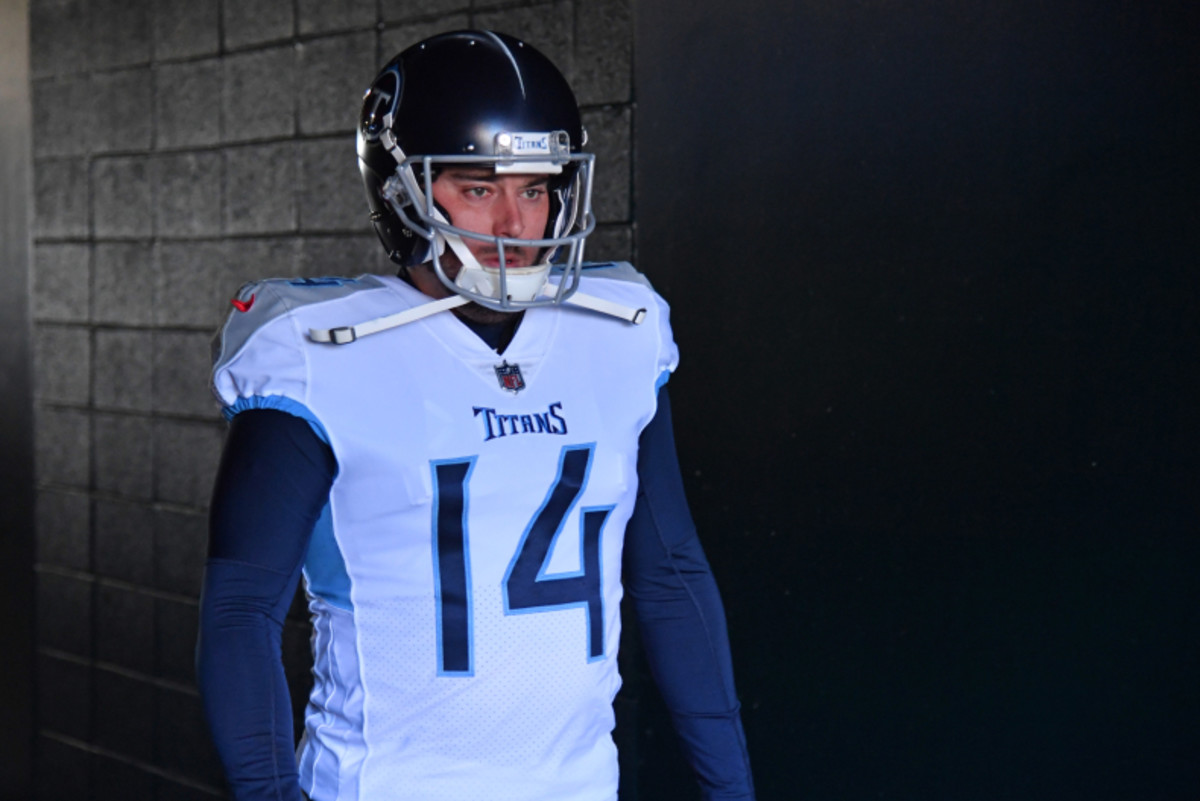 Titans release veterans Lewan, Woods and Bullock