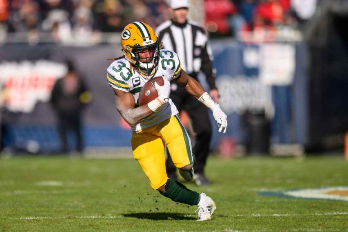 What Does Aaron Jones' Pay Cut Mean for AJ Dillon?