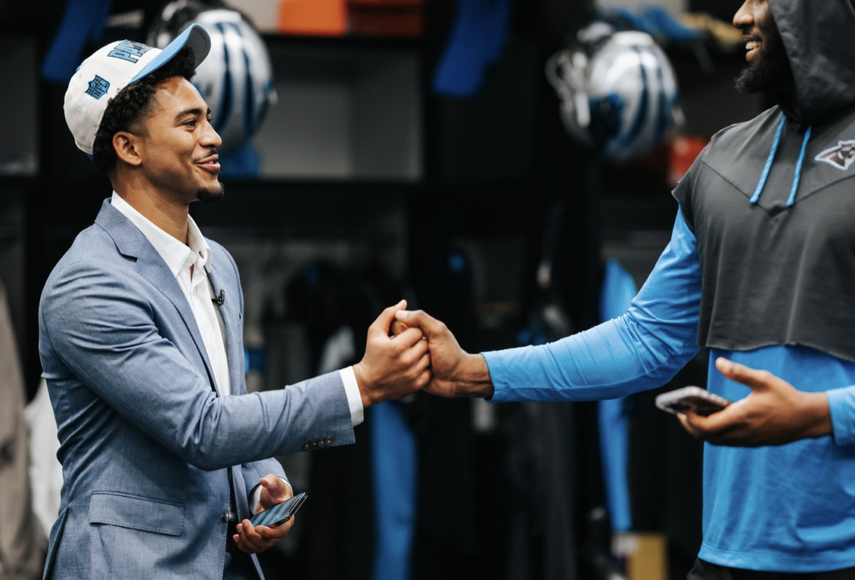 Bryce Young Looks Tiny Standing Next To Panthers DL Brian Burns ...