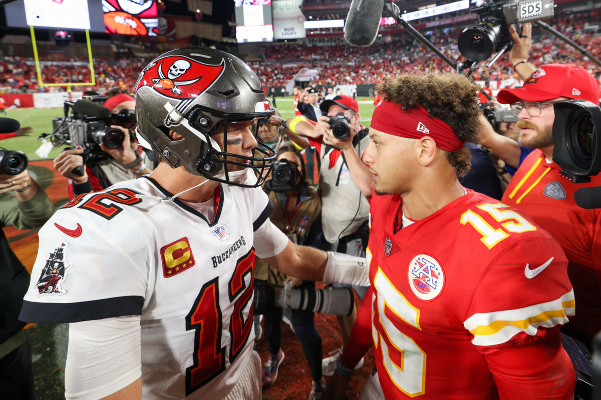 Oct 2, 2022; Tampa, Florida, USA; Tampa Bay Buccaneers quarterback Tom Brady (12) greets Kansas City Chiefs quarterback Patrick Mahomes (15) after a game at Raymond James Stadium. Mandatory Credit: Nathan Ray Seebeck-USA TODAY Sports