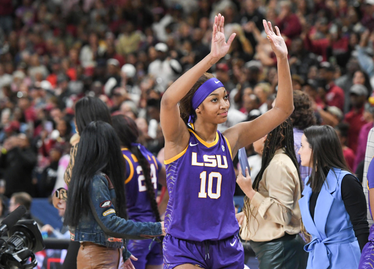 Louisiana State University forward Angel Reese (10) waves to fans after South Carolina beat LSU for the SEC Women's Basketball Tournament Championship