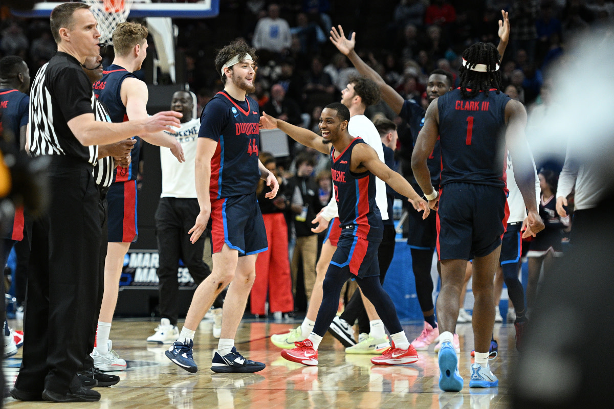 No. 11 Seed Duquesne Upsets No. 6 Seed BYU for First March Madness Win in Over  50 Years - Athlon Sports