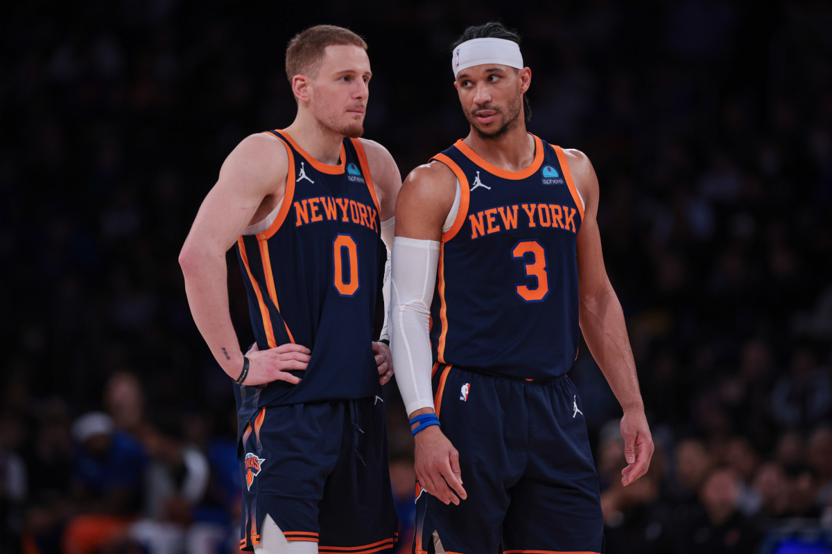 Apr 12, 2024; New York, New York, USA; New York Knicks guard Donte DiVincenzo (0) talks with guard Josh Hart (3) during the second half against the Brooklyn Nets at Madison Square Garden.