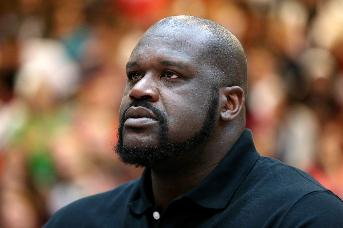 April, 1, 2016; Pearland, TX, U.S.A; TBS broadcaster Shaquille O'Neal waits to judge the dunk contest during the American Family High School Slam and 3-point championship at Dawson High School.