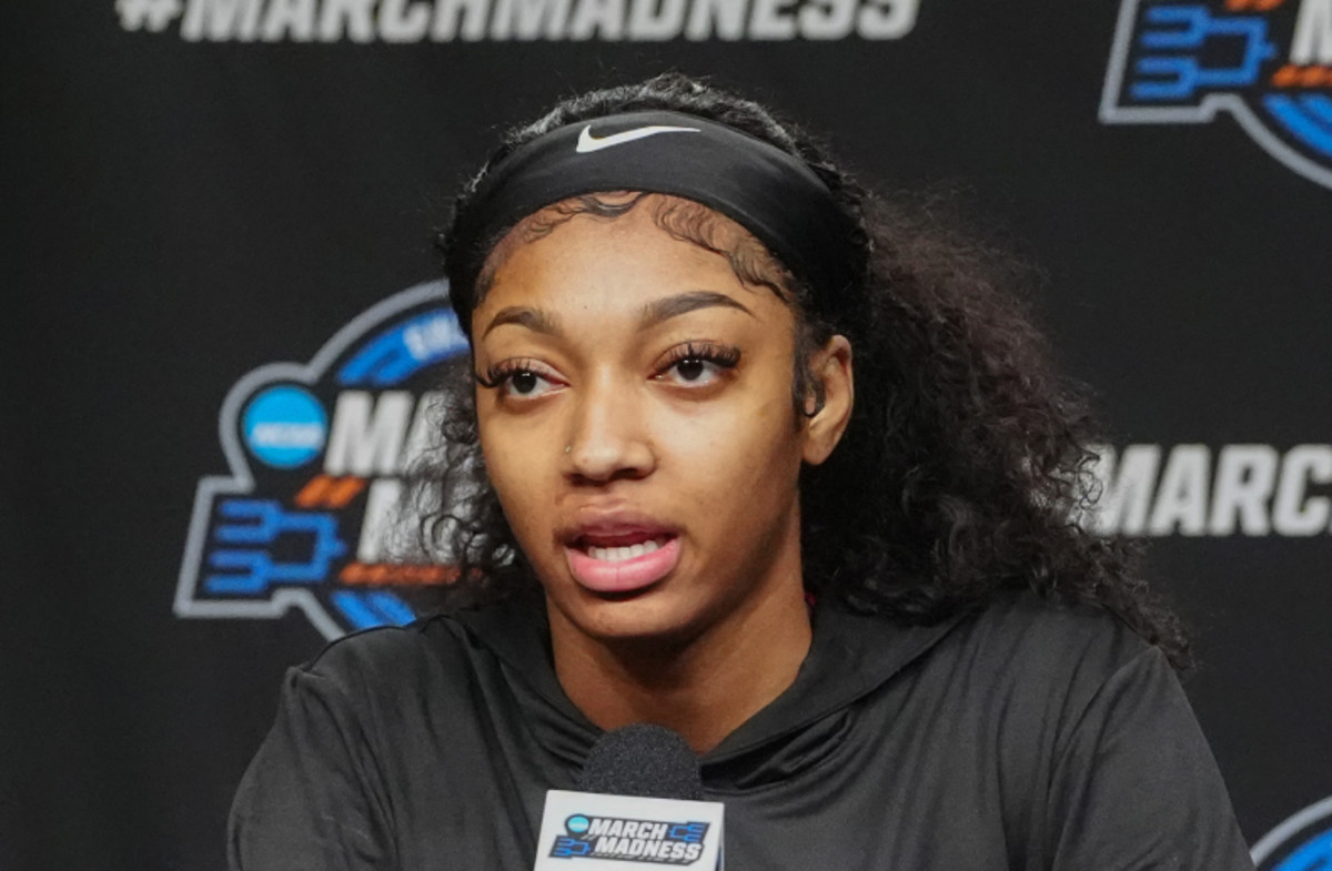 Mar 28, 2024; Albany, NY, USA; LSU Tigers guard Flau'jae Johnson (4) and forward Angel Reese (10) answer questions during the press conference to their NCAA Tournament Sweet 16 game at MVP Arena (Cropped)