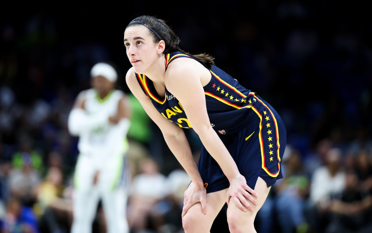 Indiana Fever guard Caitlin Clark (22) reacts during the second half against the Dallas Wings at College Park Center. 