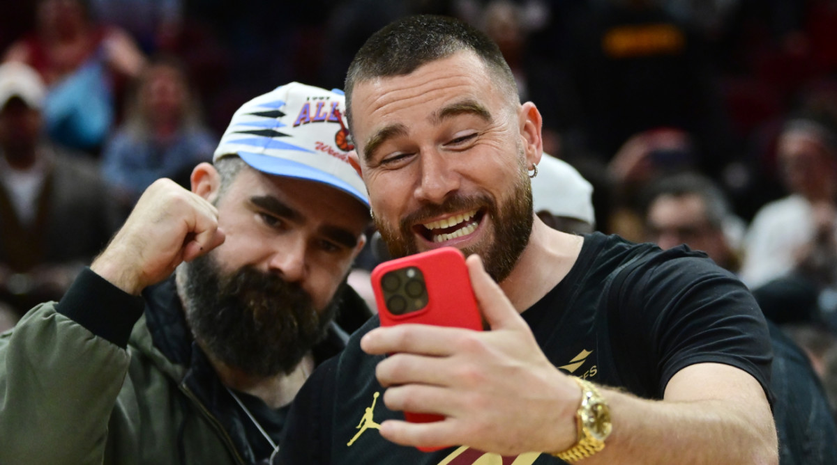 Jason and Travis Kelce sit courtside at a Cleveland Cavaliers game.