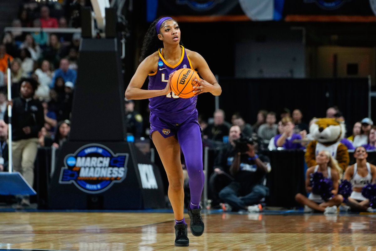 LSU Lady Tigers forward Angel Reese (10) controls the ball in the first quarter against the Iowa Hawkeyes in the finals of the Albany Regional in the 2024 NCAA Tournament at MVP Arena.