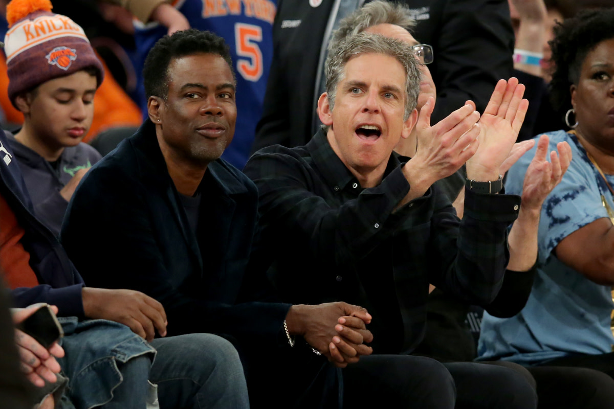 American actors and comedians Chris Rock (left) and Ben Stiller sit courtside during the third quarter between the New York Knicks and the Miami Heat at Madison Square Garden.