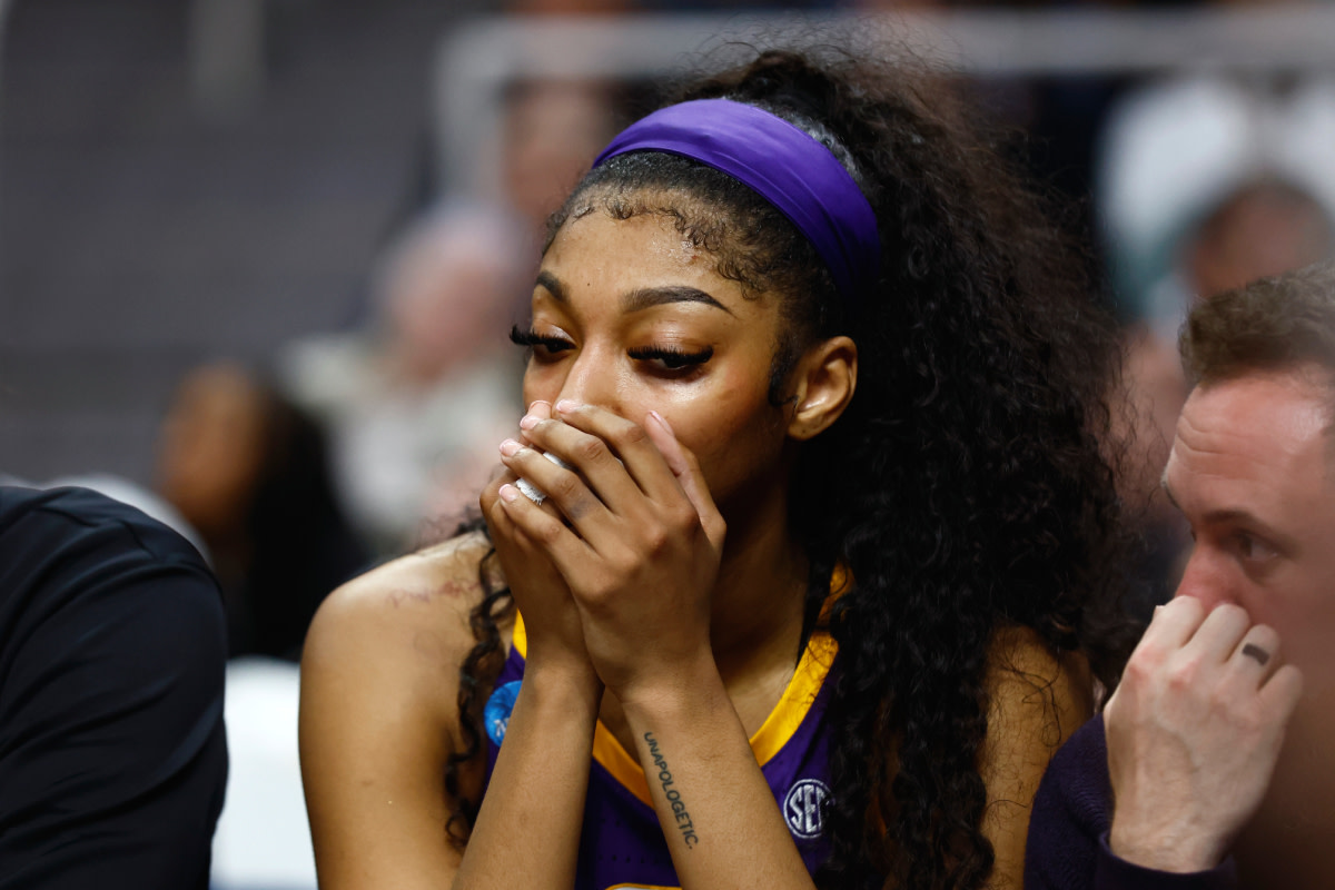 LSU Lady Tigers forward Angel Reese (10) reacts on the bench in the fourth quarter against the Iowa Hawkeyes in the finals of the Albany Regional in the 2024 NCAA Tournament at MVP Arena.