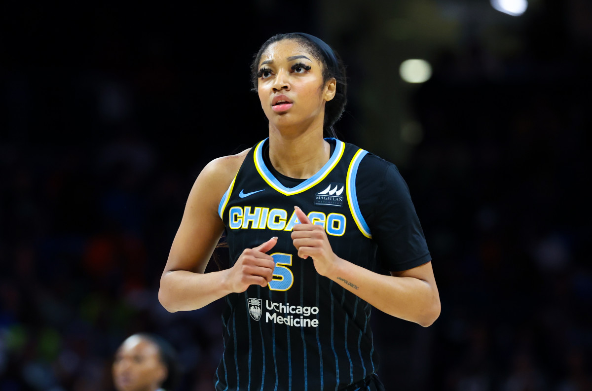 May 15, 2024; Arlington, Texas, USA; Chicago Sky forward Angel Reese (5) and Dallas Wings forward Maddy Siegrist (20) in action during the second half at College Park Center.