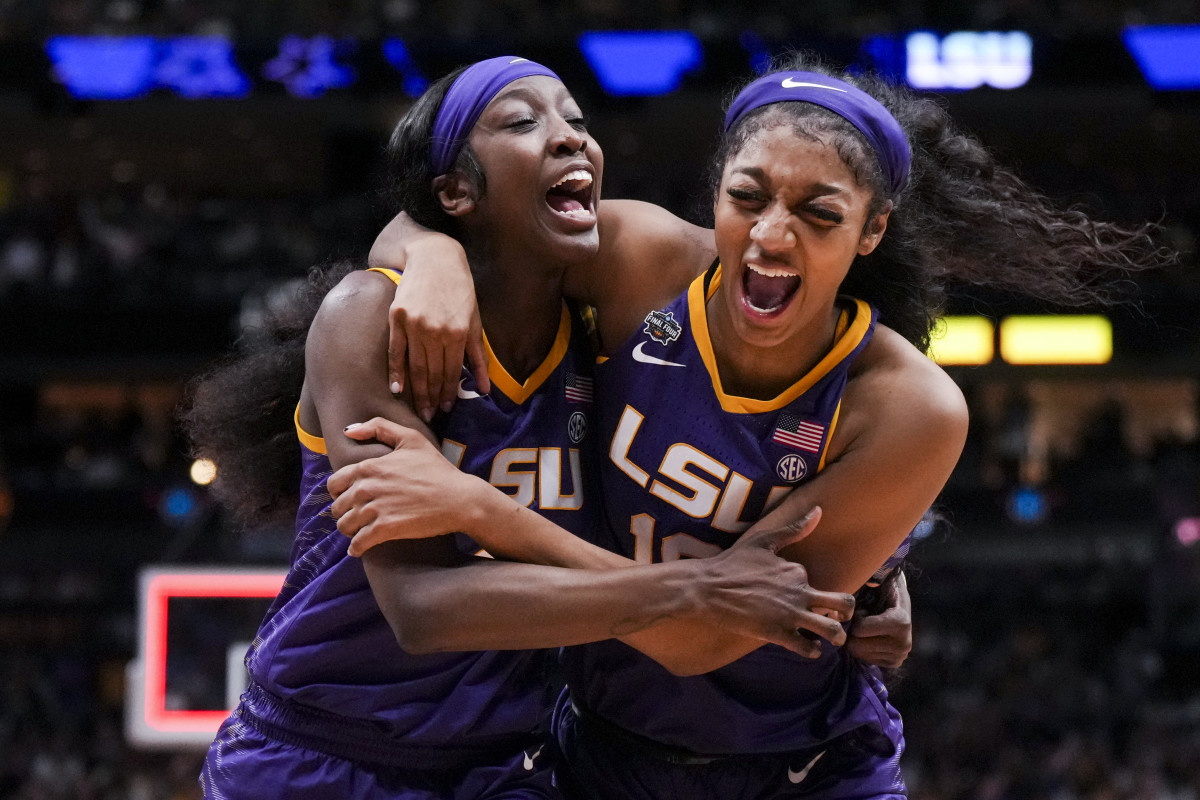 LSU Lady Tigers guard Flau'jae Johnson, left, celebrates with forward Angel Reese after defeating the Virginia Tech Hokies.