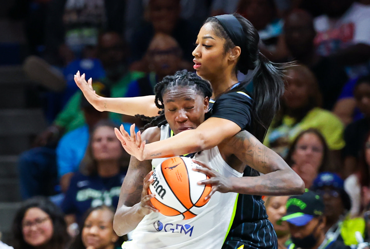 Dallas Wings forward Natasha Howard (6) looks to score as Chicago Sky forward Angel Reese (5) defends during the second half at College Park Center.