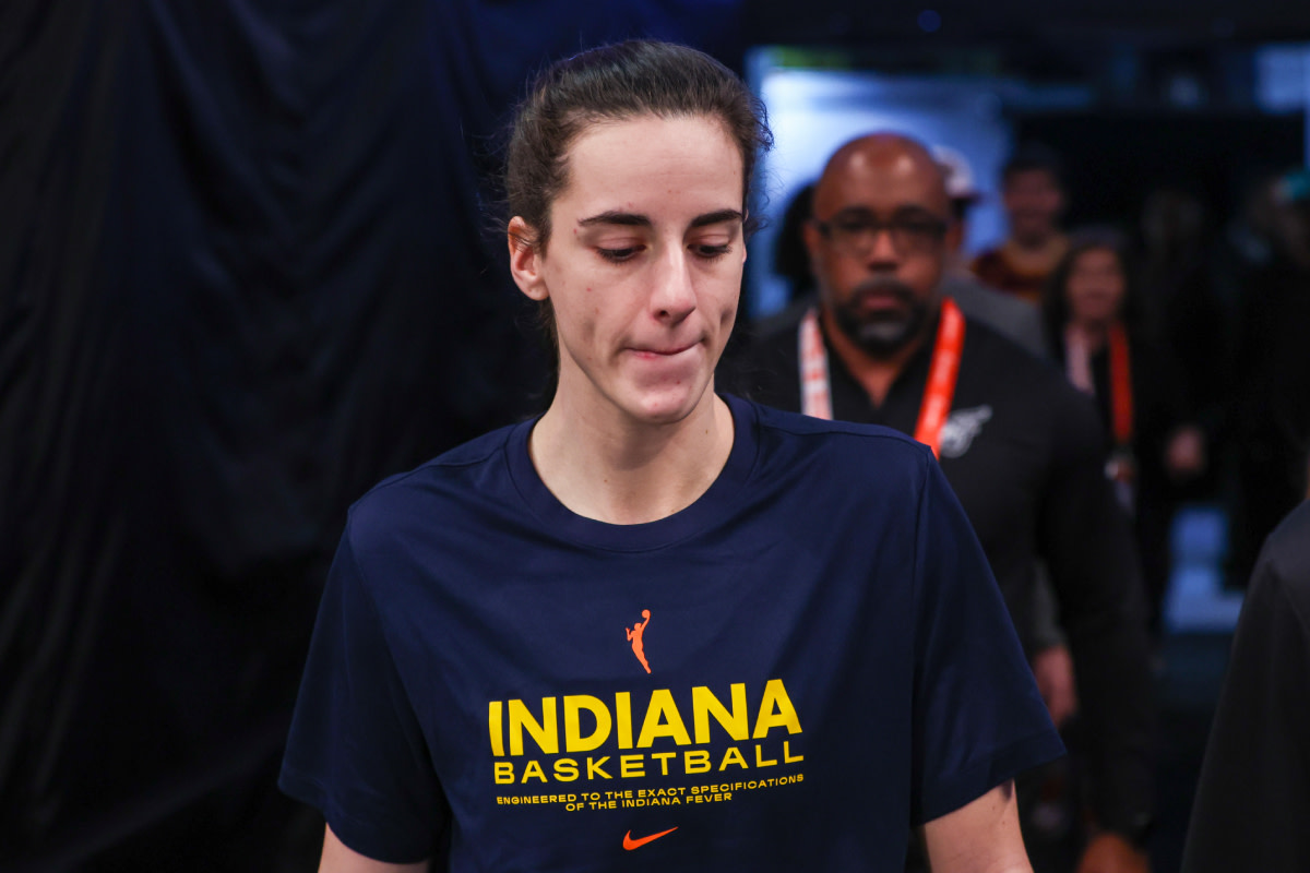 Indiana Fever guard Caitlin Clark (22) walks onto the court prior to the game against the New York Liberty at Barclays Center. 