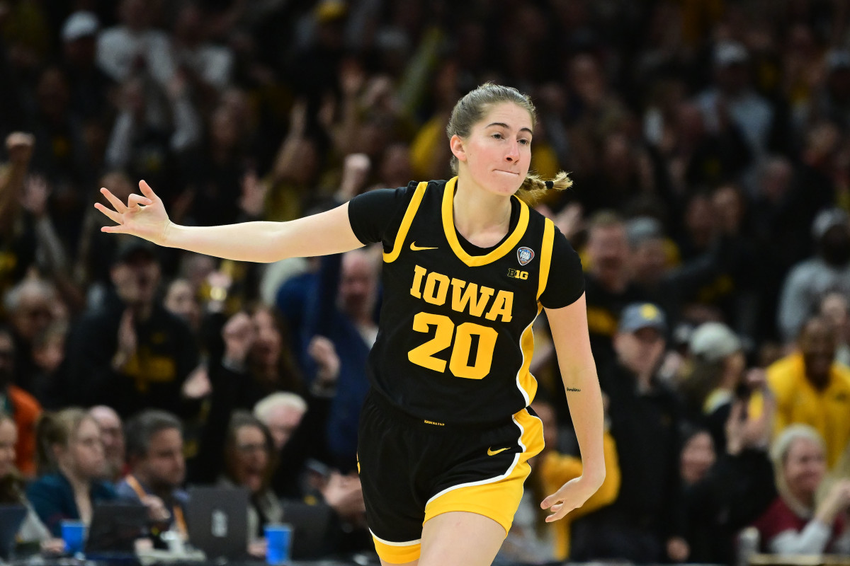 Apr 7, 2024; Cleveland, OH, USA; Iowa Hawkeyes guard Kate Martin (20) reacts after a basket against the South Carolina Gamecocks in the finals of the Final Four of the womens 2024 NCAA Tournament at Rocket Mortgage FieldHouse.