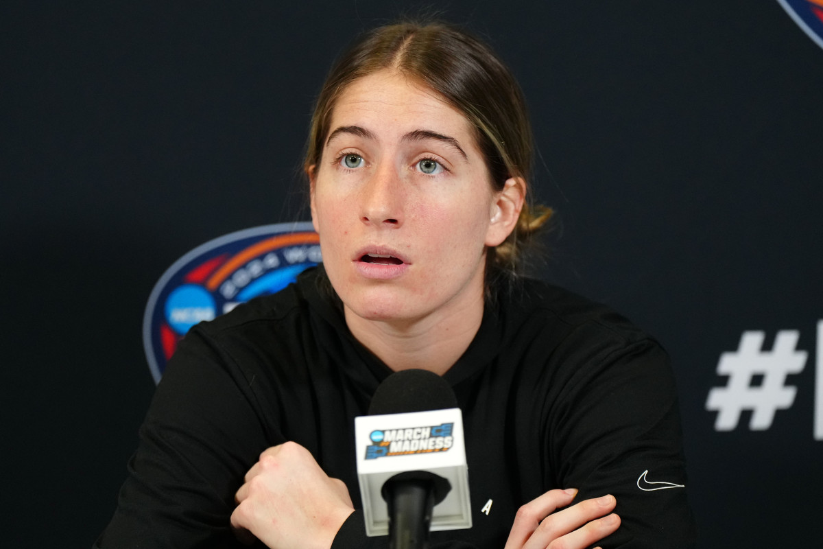Apr 6, 2024; Cleveland, OH, USA; Iowa Hawkeyes guard Kate Martin speaks at press conference at Rocket Mortgage FieldHouse.