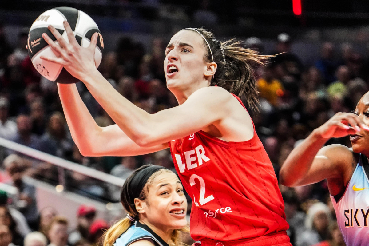 Jun 1, 2024; Indianapolis, Indiana, USA; Indiana Fever guard Caitlin Clark (22) drives to the basket against the Chicago Sky during a game at Gainbridge Fieldhouse.