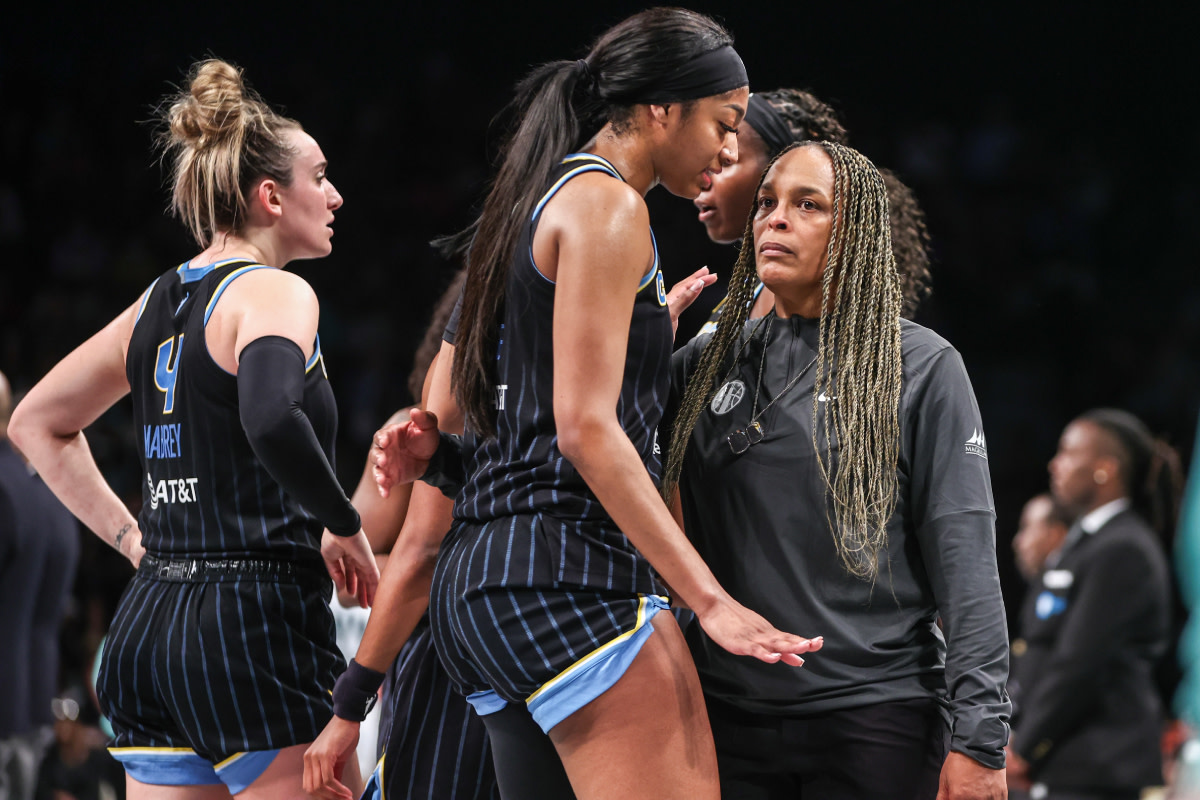 Chicago Sky forward Angel Reese (5) talks with head coach Teresa Weatherspoon during a time out in the fourth quarter against the New York Liberty at Barclays Center.