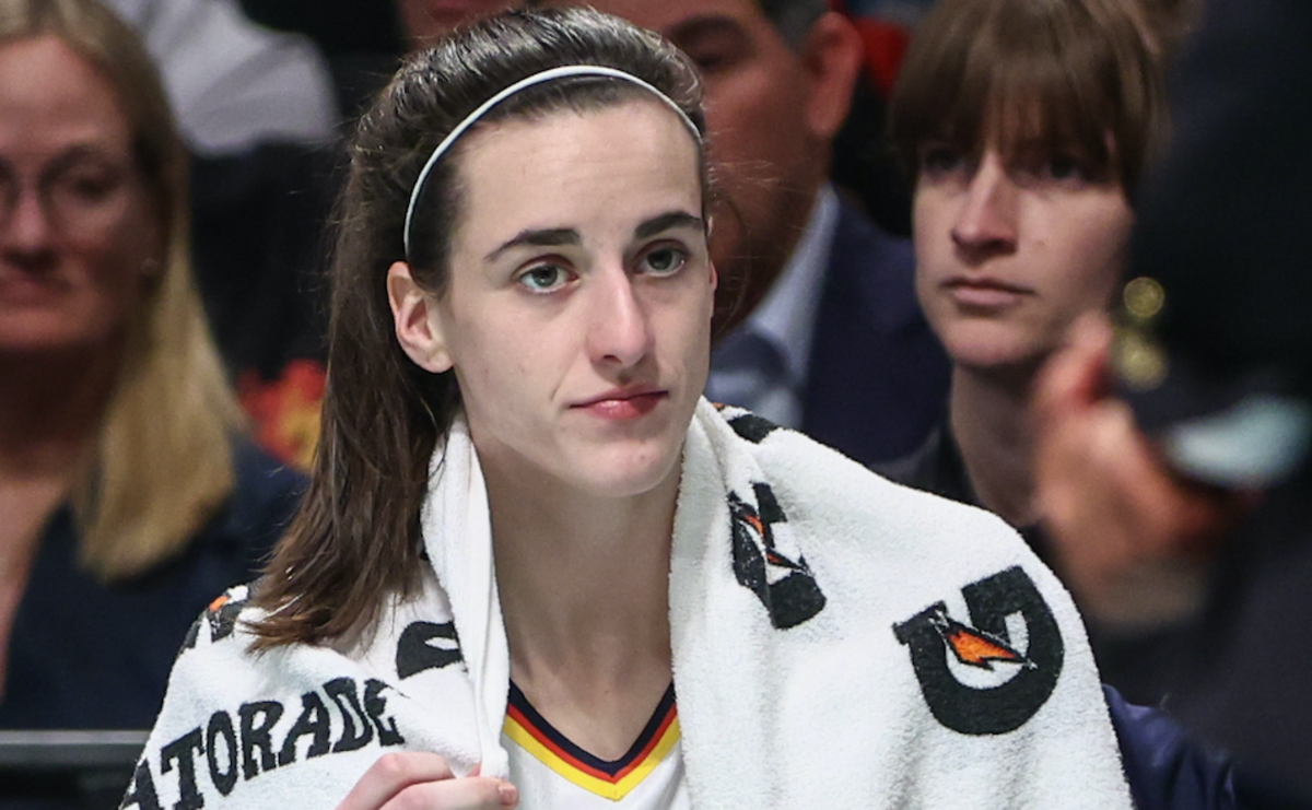 Jun 2, 2024; Brooklyn, New York, USA; Indiana Fever guard Caitlin Clark (22) sits on the bench in the fourth quarter against the New York Liberty at Barclays Center. Mandatory Credit: Wendell Cruz-USA TODAY Sports 