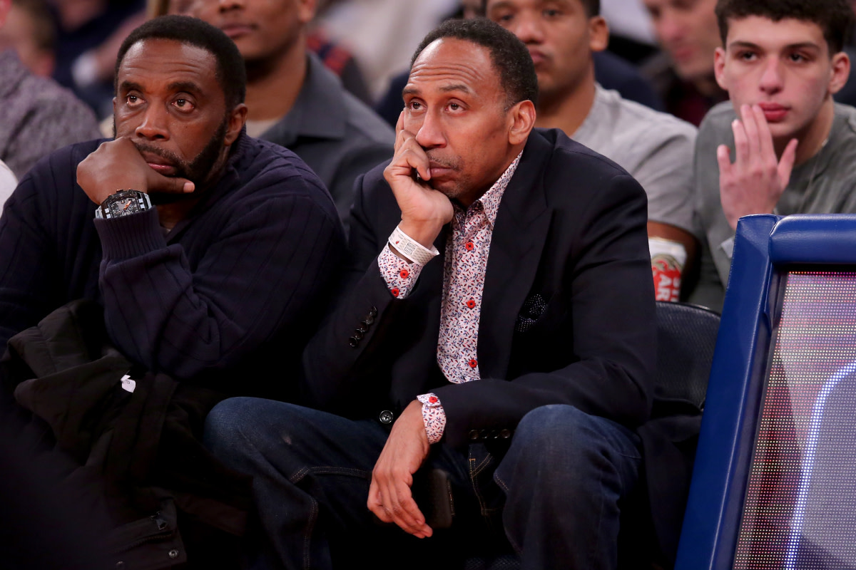 Sports broadcaster Stephen A. Smith sits court side during the third quarter between the New York Knicks and the Miami Heat at Madison Square Garden.