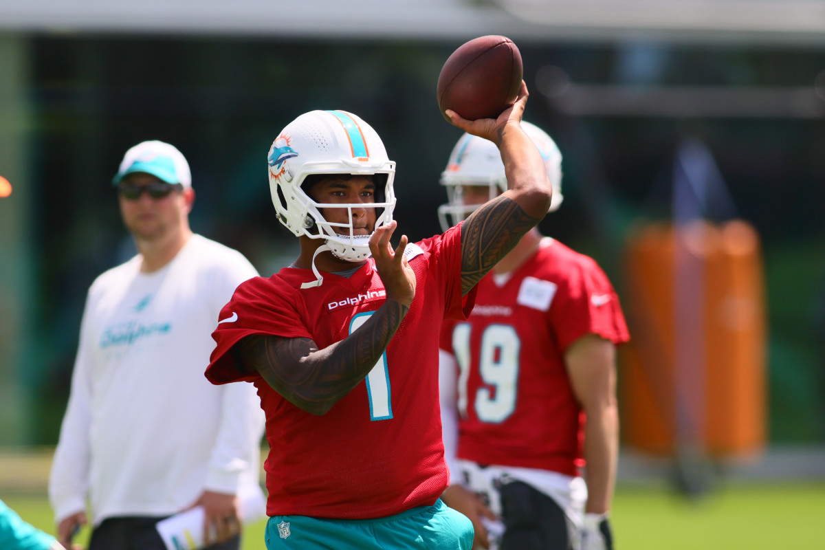 Miami Dolphins quarterback Tua Tagovailoa (1) throws the football during a mandatory minicamp at Baptist Health Training Complex.