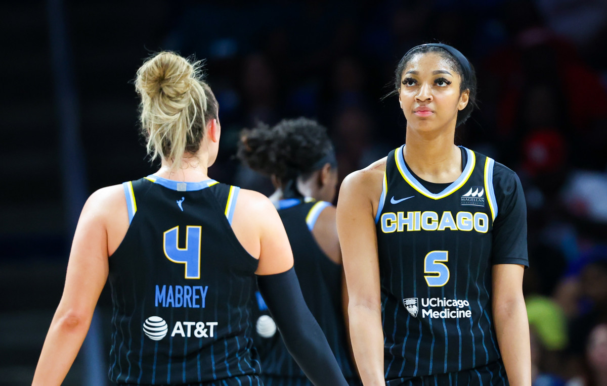 May 15, 2024; Arlington, Texas, USA; Chicago Sky forward Angel Reese (5) and Chicago Sky guard Marina Mabrey (4) react during the second half against the Dallas Wings at College Park Center. Mandatory Credit: Kevin Jairaj-USA TODAY Sports