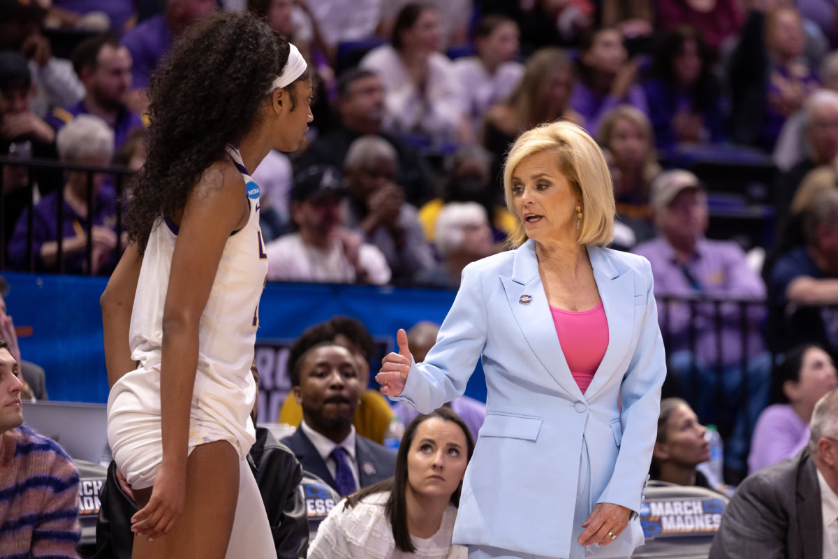 LSU Lady Tigers head coach Kim Mulkey sends forward Angel Reese (10) back into the game against the Rice Owls during the second half at Pete Maravich Assembly Center. 
