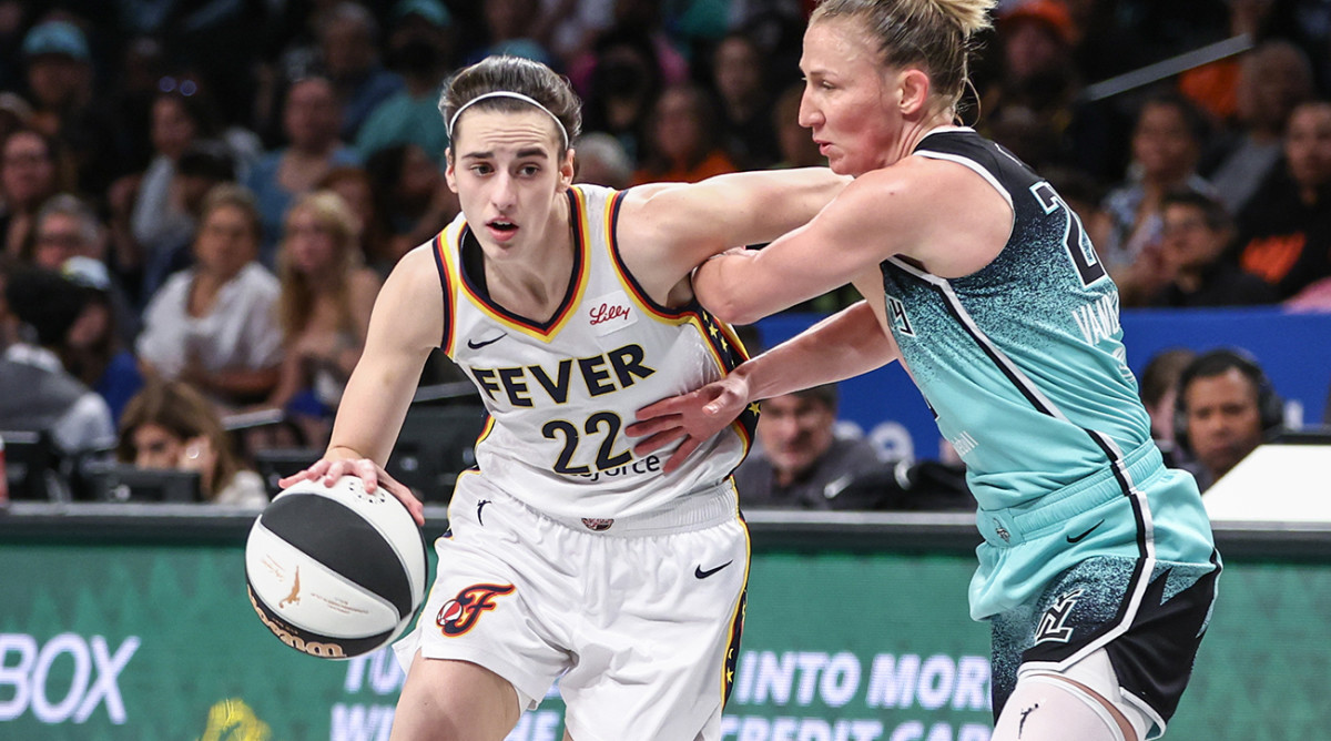 Indiana Fever guard Caitlin Clark drives past New York Liberty guard Courtney Vandersloot in their game at Barclays Center on June 2, 2024.