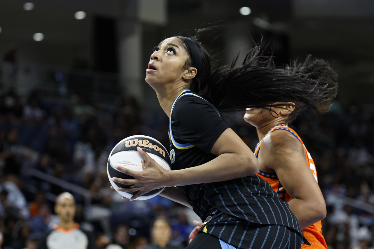 Jun 12, 2024; Chicago, Illinois, USA; Chicago Sky forward Angel Reese (5) goes to the basket against the Connecticut Sun during the second half of a basketball game at Wintrust Arena.