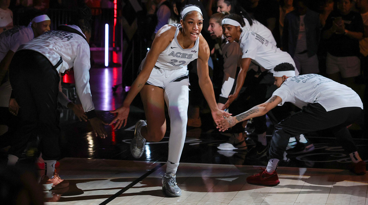 A’ja Wilson of the Las Vegas Aces is greeted by teammates during player introductions before the team’s home opener against the Phoenix Mercury at Michelob ULTRA Arena on May 14, 2024, in Las Vegas.