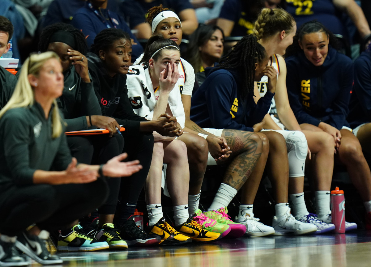 Indiana Fever guard Caitlin Clark on the bench with her teammates at Mohegan Sun Arena on Jun 10, 2024.