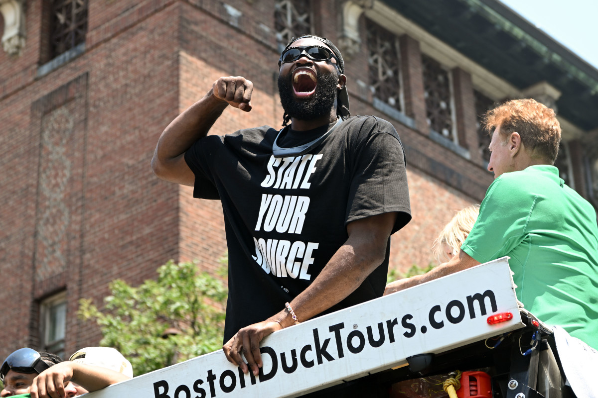 Jun 21, 2024; Boston, MA, USA; Boston Celtics guard Jaylen Brown (7) reacts during the 2024 NBA Championship parade in Boston.