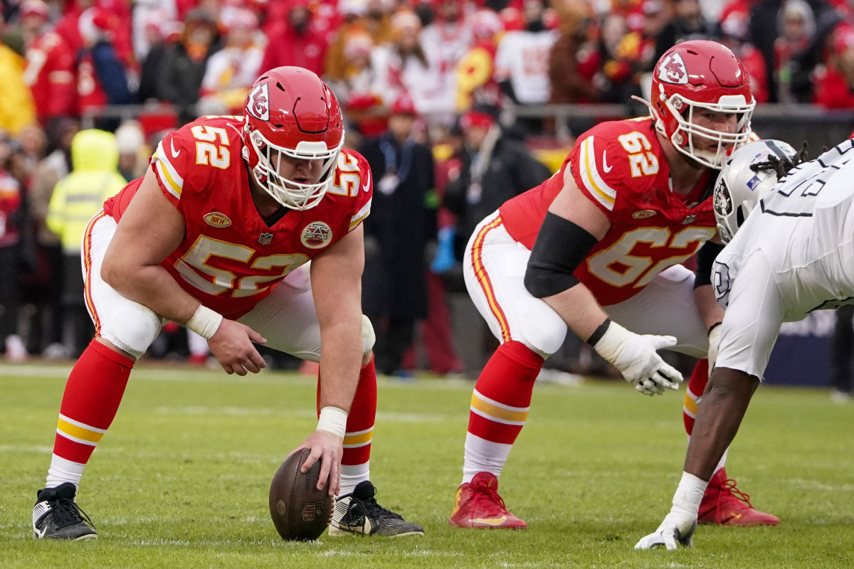 Dec 25, 2023; Kansas City, Missouri, USA; Kansas City Chiefs center Creed Humphrey (52) and guard Joe Thuney (62) at the line of scrimmage against the Las Vegas Raiders during the game at GEHA Field at Arrowhead Stadium. 