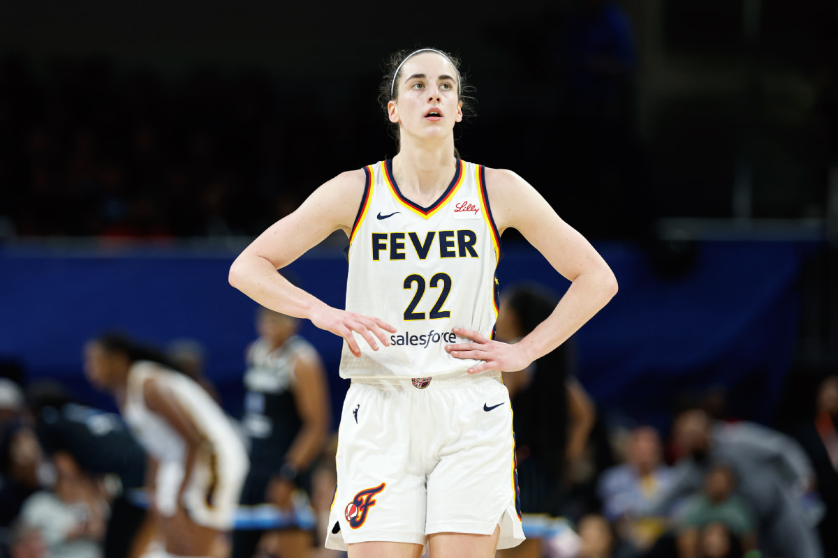 Indiana Fever guard Caitlin Clark (22) walks on the court against the Chicago Sky at Wintrust Arena.