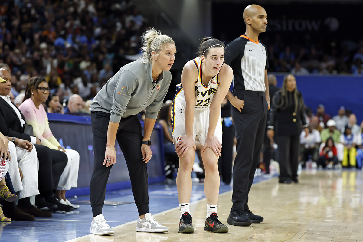 Jun 23, 2024; Chicago, Illinois, USA; Indiana Fever head coach Christie Sides talks with guard Caitlin Clark (22) during the second half of a basketball game against the Chicago Sky at Wintrust Arena.
