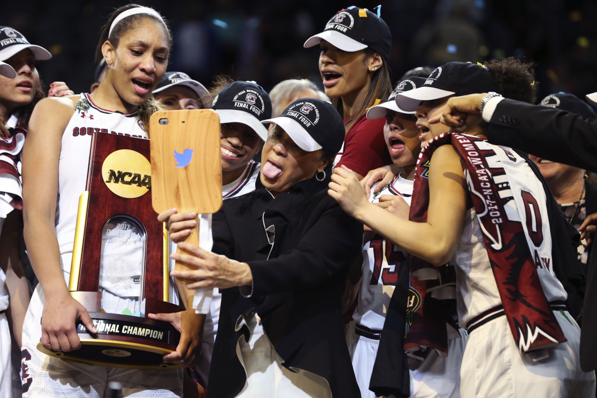 Mar 26, 2018; Albany , NY, USA; South Carolina Gamecocks head coach Dawn Staley greets forward A'ja Wilson (22) on the sidelines after being taken out of the game against the Connecticut Huskies during the second half in the championship game of the Albany regional of the women's basketball 2018 NCAA Tournament at the Times Union Center.