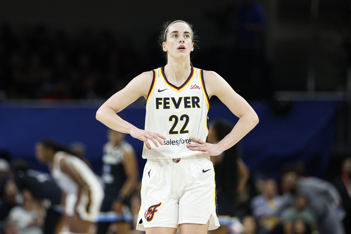 Jun 23, 2024; Chicago, Illinois, USA; Indiana Fever guard Caitlin Clark (22) walks on the court during the second half of a basketball game against the Chicago Sky at Wintrust Arena.