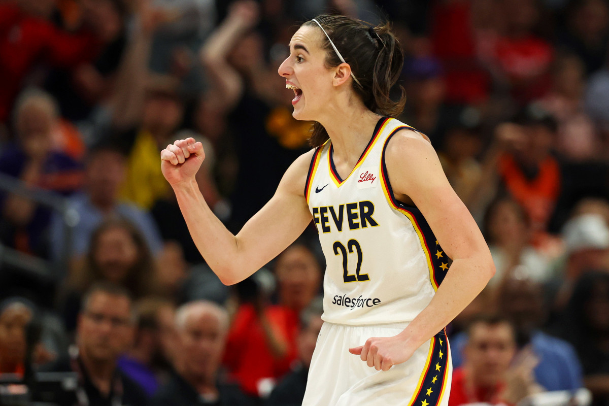 Jun 30, 2024; Phoenix, Arizona, USA; Indiana Fever guard Caitlin Clark (22) reacts during the second half of the game against the Phoenix Mercury at Footprint Center.
