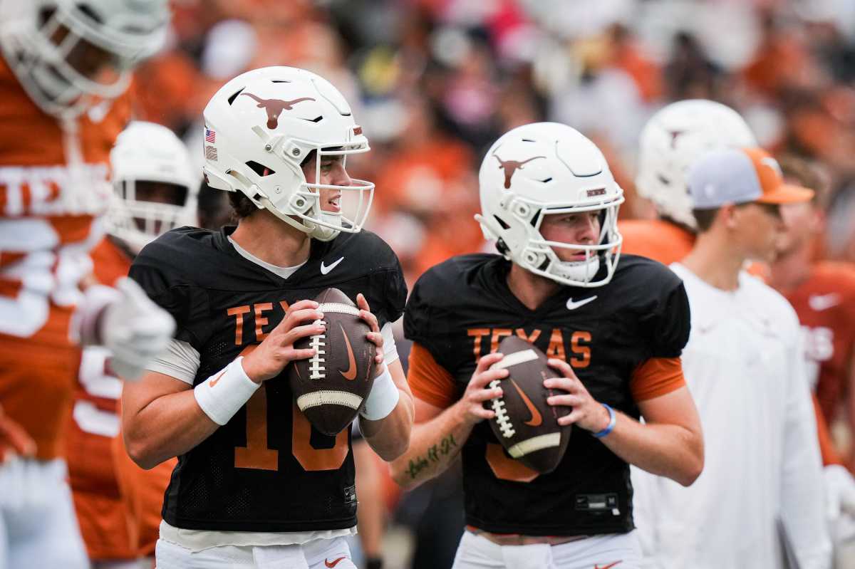 Texas Longhorns quarterbacks Arch Manning (16), left, and Quinn Ewers (3) throw passes while warming up ahead of the Longhorns' spring Orange and White game at Darrell K Royal Texas Memorial Stadium in Austin, Texas, April 20, 2024. 