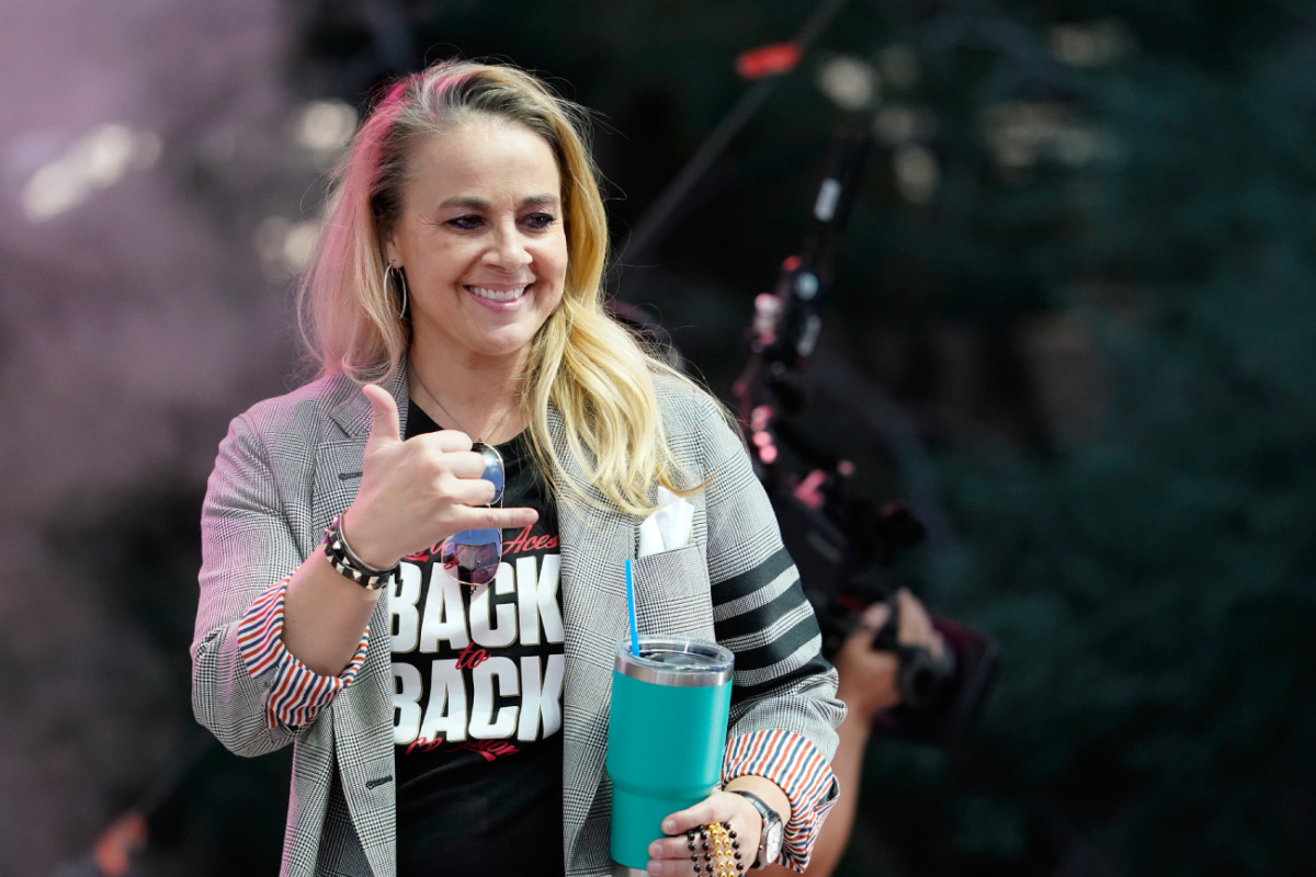 Las Vegas Aces head coach Becky Hammon celebrated during the Aces' 2024 WNBA Championship parade.