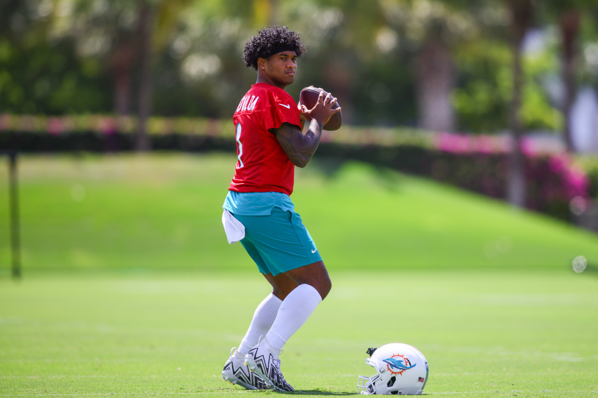 Miami Dolphins quarterback Tua Tagovailoa (1) throws the football during mandatory minicamp at Baptist Health Training Complex.