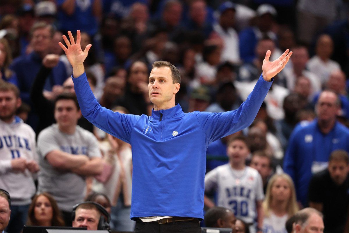 Mar 31, 2024; Dallas, TX, USA; Duke Blue Devils head coach Jon Scheyer reacts in the second half against the North Carolina State Wolfpack in the finals of the South Regional of the 2024 NCAA Tournament at American Airline Center.