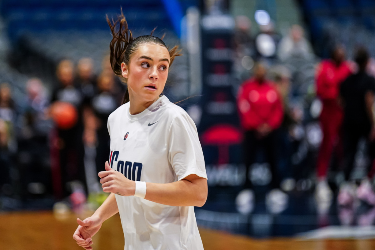 UConn Huskies guard Nika Muhl (10) warms up before the start of the game against the Louisville Cardinals at XL Center.