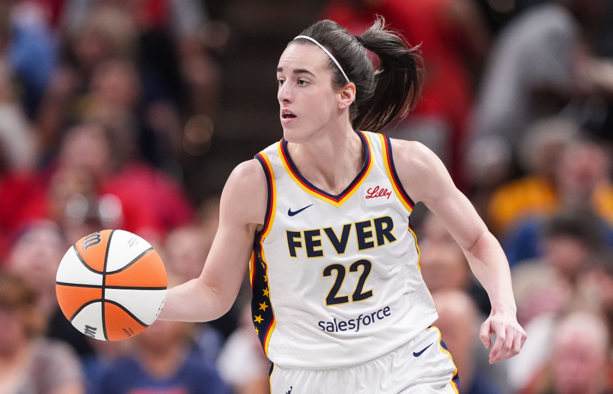 Indiana Fever guard Caitlin Clark rushes up the court at Gainbridge Fieldhouse on July 12, 2024.