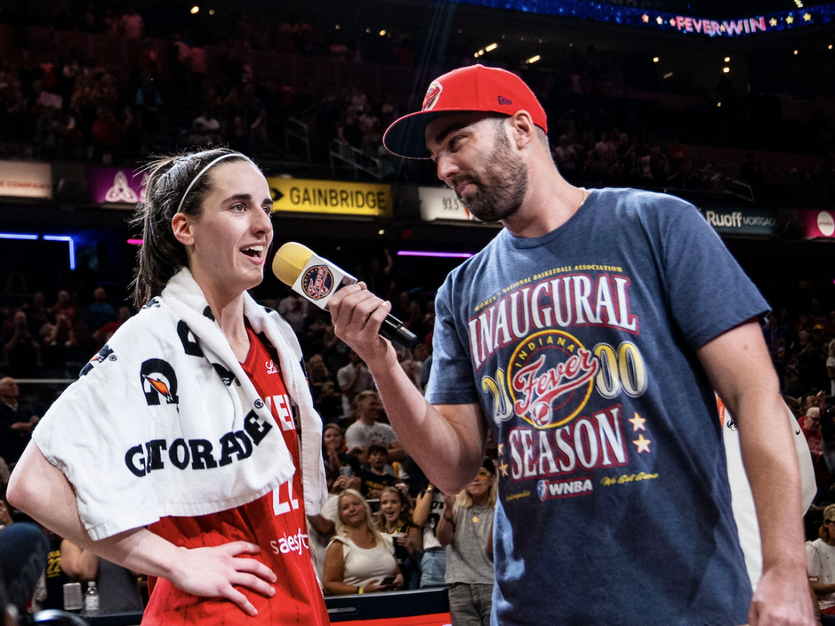 Indiana Fever guard Caitlin Clark smiles after becoming the first WNBA rookie to record a triple-double at Gainbridge Fieldhouse in Indianapolis on July 6, 2024.