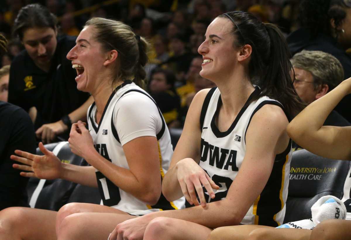 Iowa's Kate Martin (20) and Caitlin Clark (22).