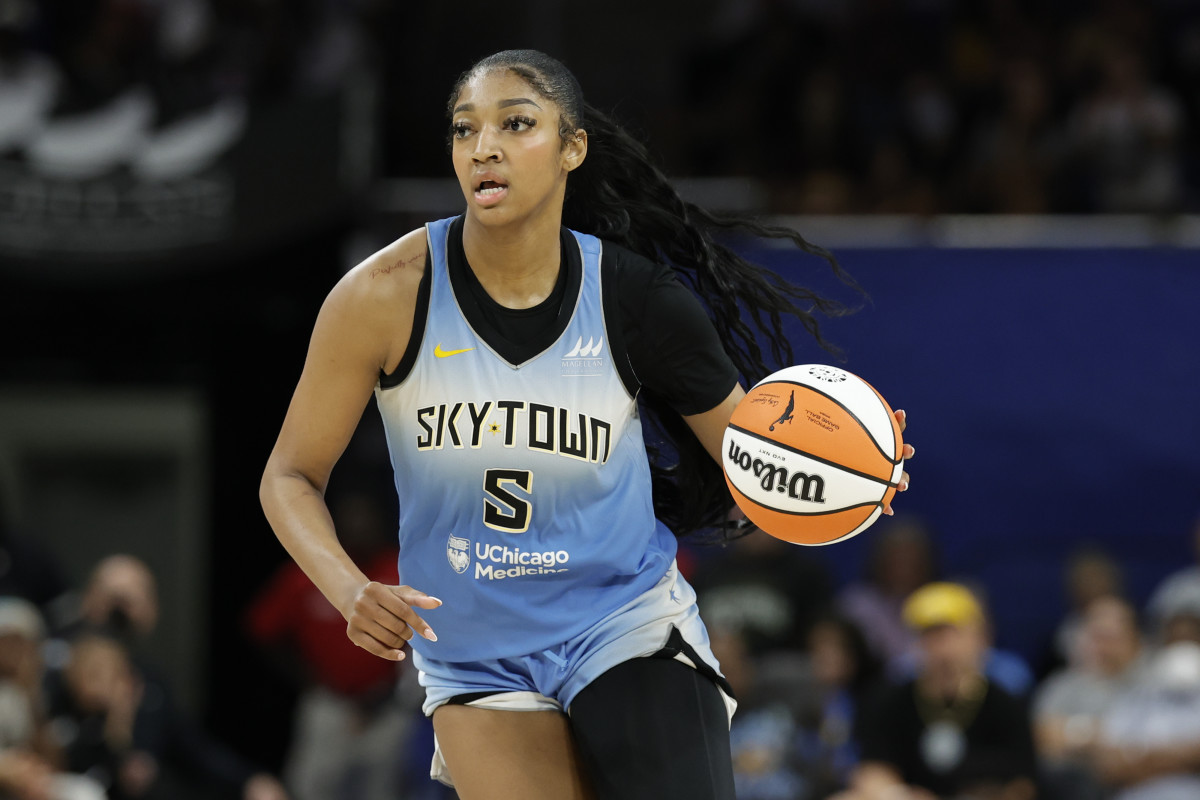 Jul 13, 2024; Chicago, Illinois, USA; Chicago Sky forward Angel Reese (5) brings the ball up court against the New York Liberty during the second half of a WNBA game at Wintrust Arena. 